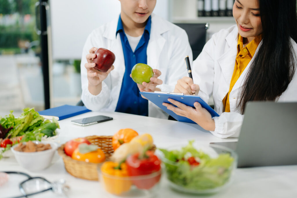 Nutritionists consulting on healthy food choices, meal planning,